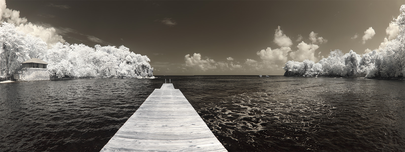 Extreme Infrared Panorama of Carribean Bay with Dock Reaching Out.